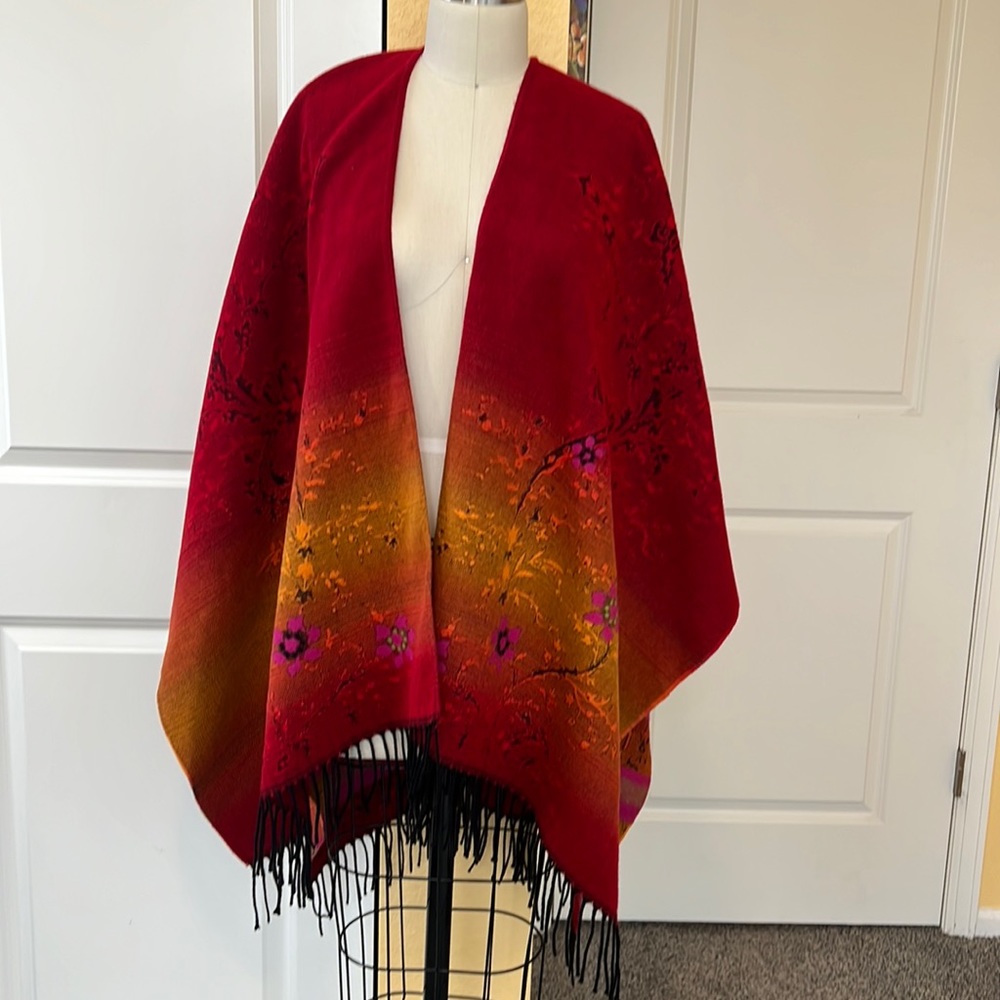 Pashmina shawl wrap in vibrant sunset colors.Ombre reds, orange, fuchsia floral
